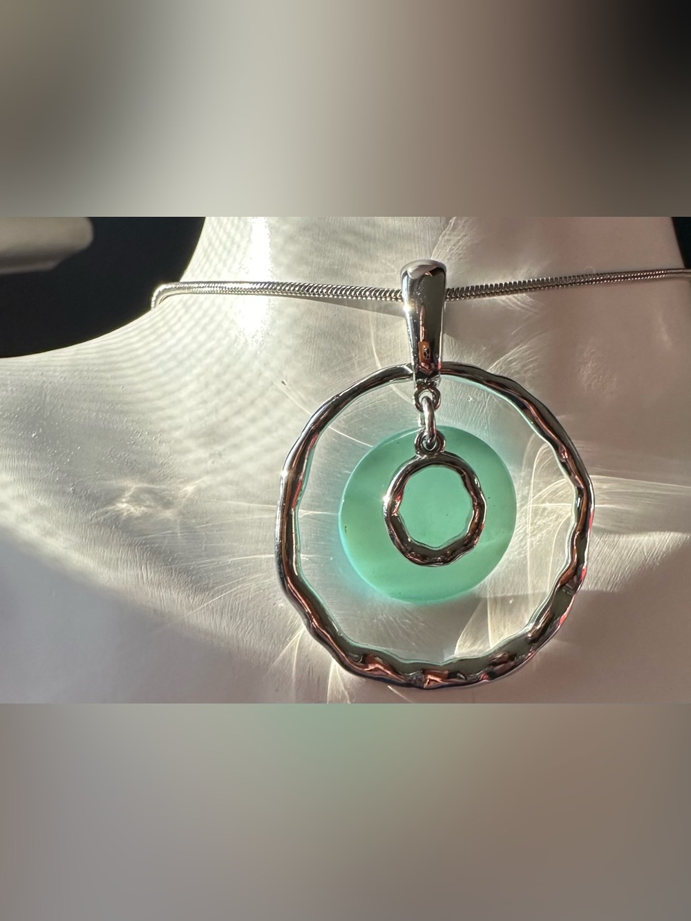 Silver Circle Pendant Necklace with Seafoam Green Glass Accent